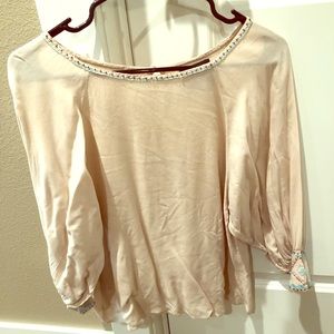 Cream top with cute detail